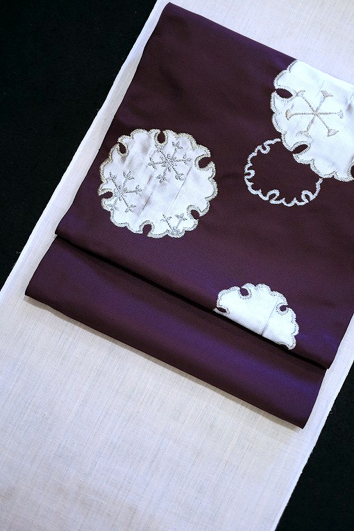 西陣織九寸名古屋帯/洛風林 雪輪文 本紫